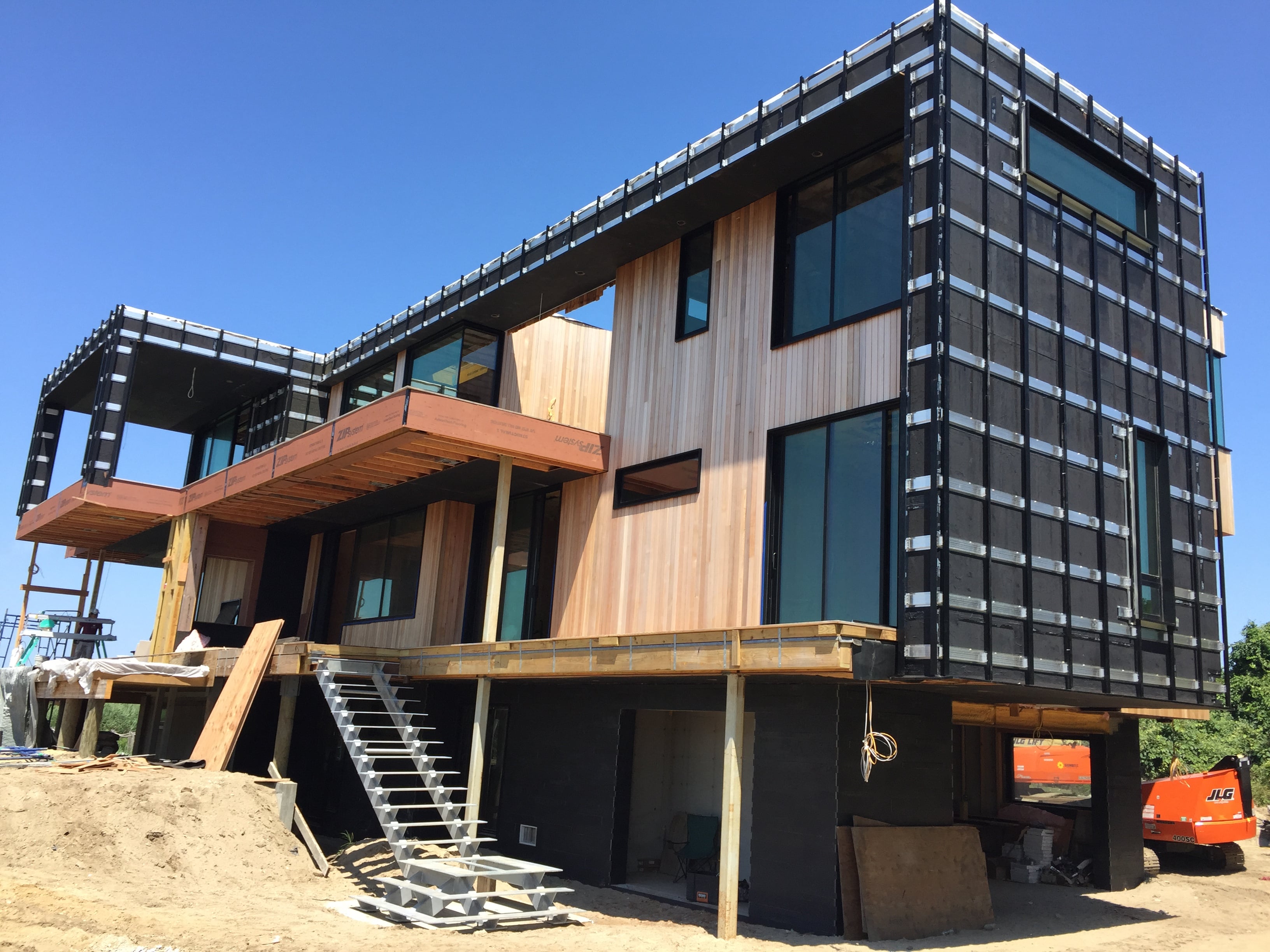 Norstone Ebony Planc on the lower level exterior facade of a residential project in the Hamptons